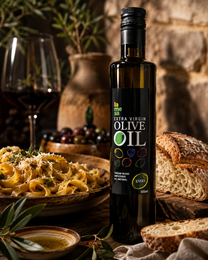 Olive oil set on the table with pasta bread and red wine