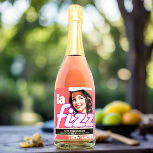 La Fizz bottle of Fizzy Pomegranate on the picnic table