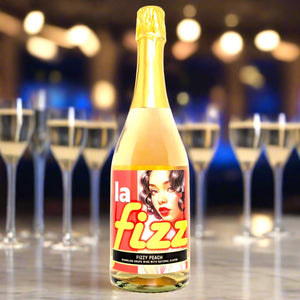 Bottle of 'la fizz' sparkling wine with a colorful label with many glasses