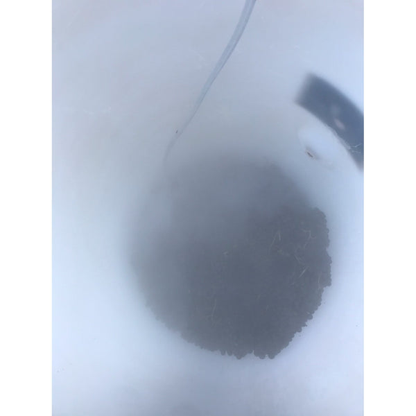 Addition of CO2 gas through dry ice, to flush the tank of all oxygen. Gamay done Beaujolais style undergoes anaerobic fermentation using CO2 instead of oxygen, giving it it's characteristic candied raspberry nose.